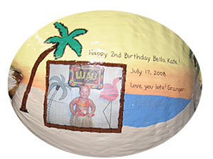 Painted coconut with picture attached