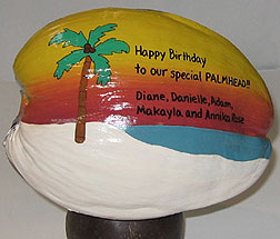 Hand painted coconuts for personalized birthday gifts, birthday party invitations and birthday party favors