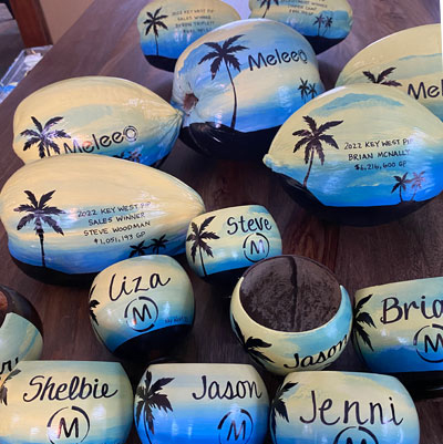 Painted coconuts for President's Club invitations