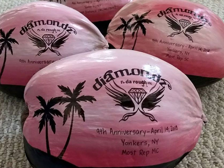 Painted coconuts make a unique trophy ideas